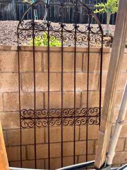 Old rod iron gate door or garden art