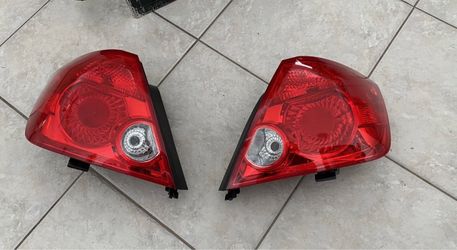 Scion tC 05 06 07 - Left & Right Factory Tail Lamps OEM