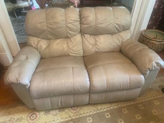 Leather Reclining  Loveseat.