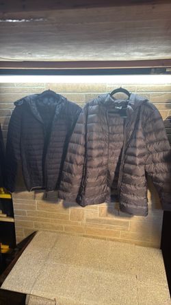 2 pair of weather Pufferjackets used $15/one blue medium size, and the other $20 extra extra large gray