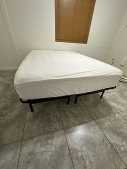 Full sized bed and metal frame