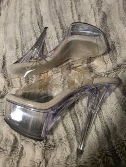 Clear used Pleasers size 6 been stored away no box