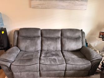 2 piece couch with accessories almost new