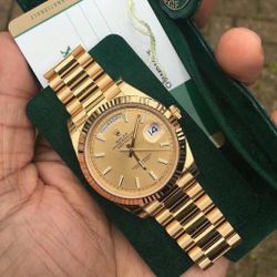 All gold R Watch