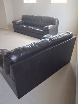 Brown leather sofa set