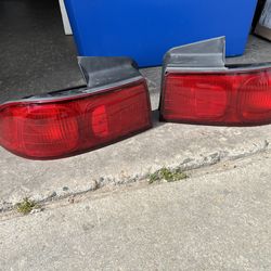 94-01 Sedan Solid Red Tail Lights Oem