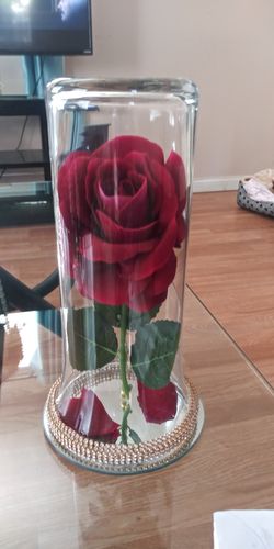 Artificial flower in glass vase