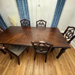 dining room table with extension and six chairs
