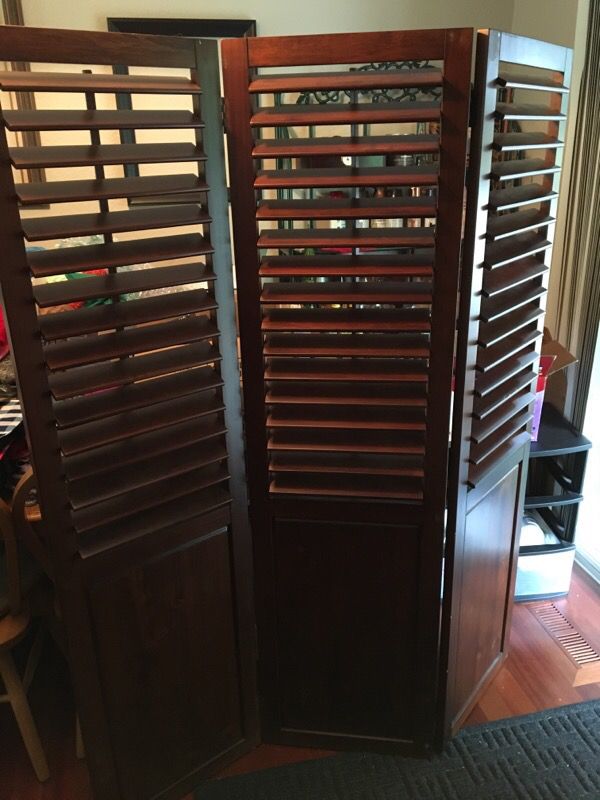 Pier one heavy wood room divider, shutter type that open and close Excellent condition