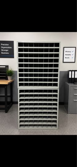That looks like a heavy-duty steel small-parts storage rack / compartment organizer, used in auto shops, machine shops, warehouses, or hardware facili