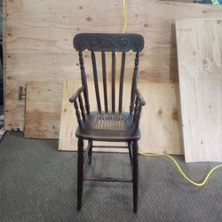 Vintage child's wooden cane chair
