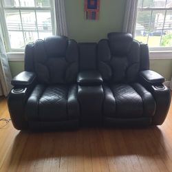 Do love seat retreat movie theater's style?3 compartment to store stuff.Two cup holders movie theater lights forth from Bobs discount furniture