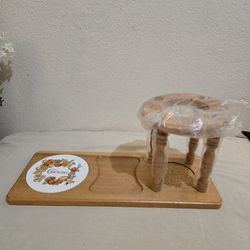 Vintage cheese board with wine bottle and glass holders