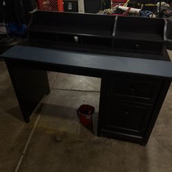 Black desk (with blue accent strip) 
