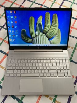 15.6”inch AMD Athlon HP Laptop, 256GB SSD, 4GB RAM, Inbuilt Bluetooth, HDMI And Type C Port, SD Card Reader And a WebCam. Windows 11 Installed.
