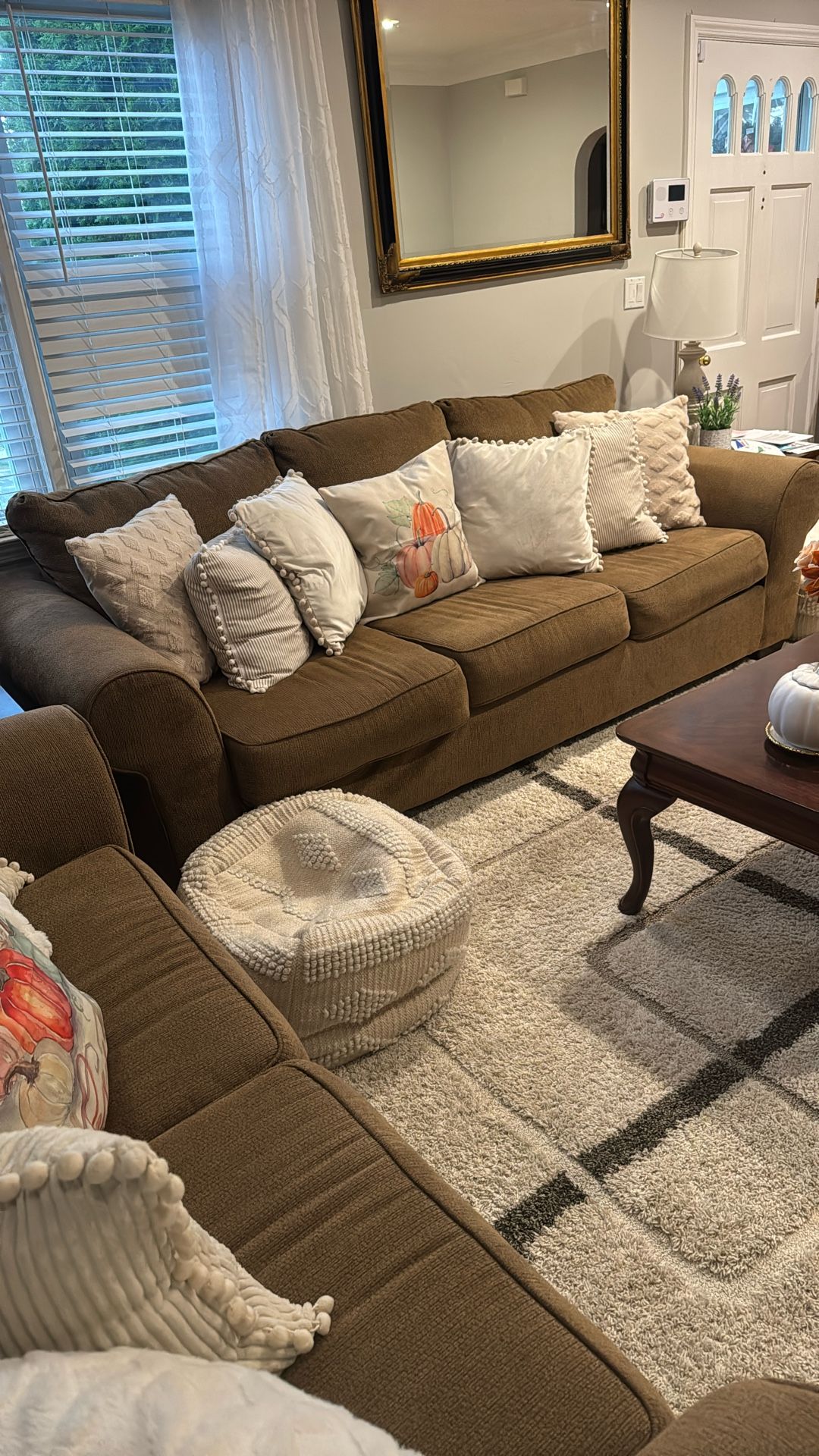 I am selling a living room set with three tables in good condition and clean.