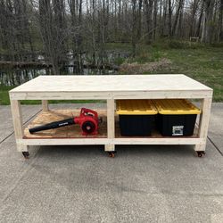4x8 Heavy Duty custom made workbench on locking casters. 