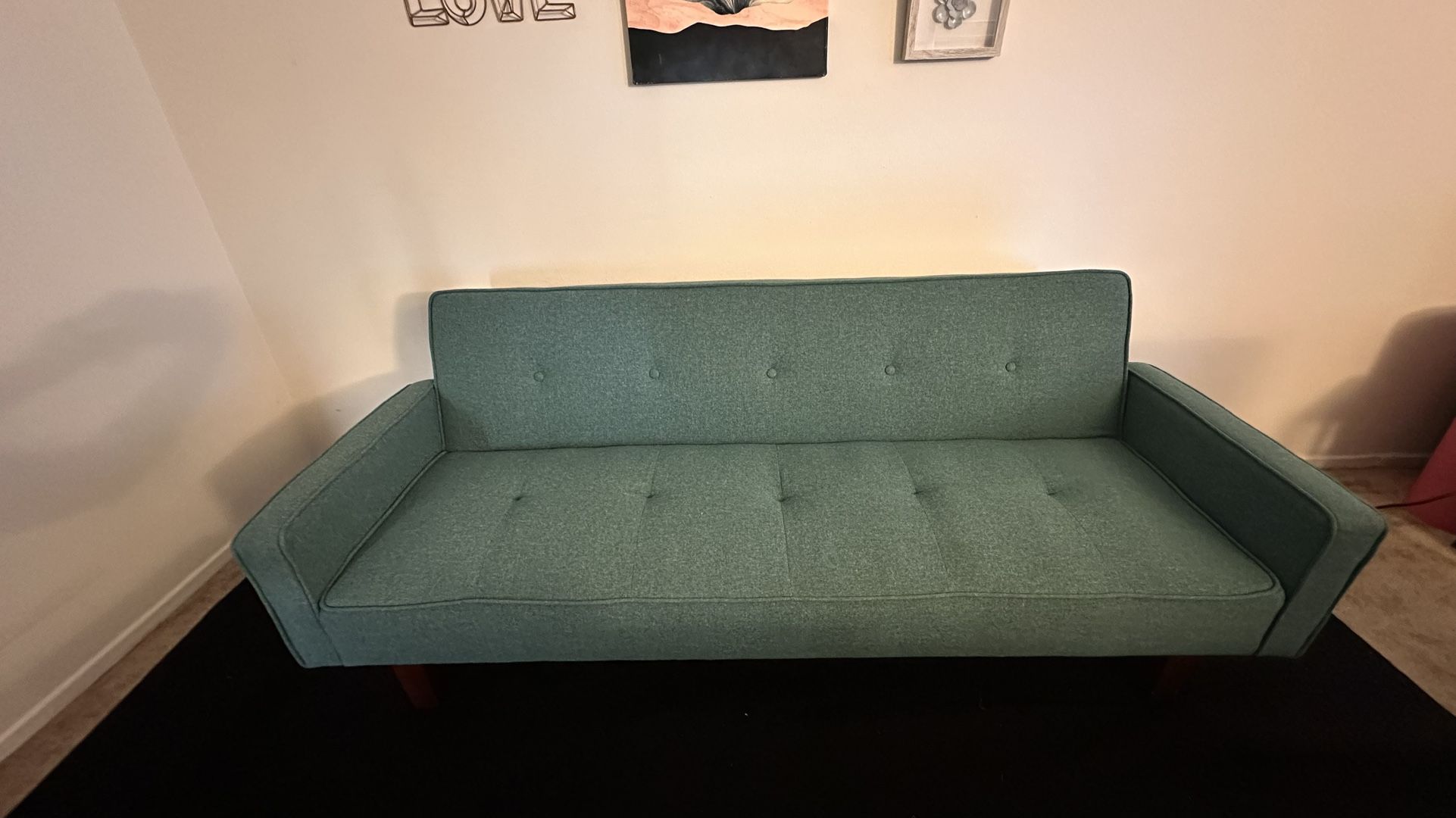 65” Used Turquoise Cloth Futon/Sofa