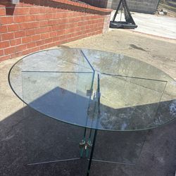 Glass table with gold fixtures