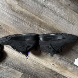 Black Cat Jordan 4’s