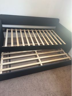 Twin bed frame with pull out twin frame