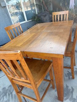 Comedor de madera de 4 sillas