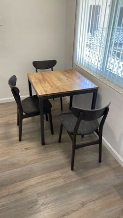 Small dining table with 3 chairs