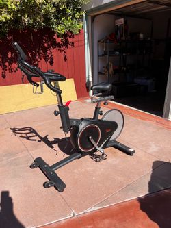 Sunny Health & Fitness Magnetic Rear Belt Drive Stationary Bike