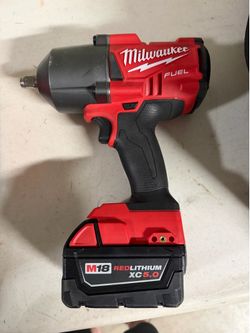 Milwaukee  1/2 impact drill with Fast Charger and Battery