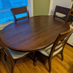 Dining Table And Four Chairs