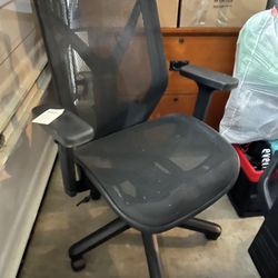 Two black office chairs