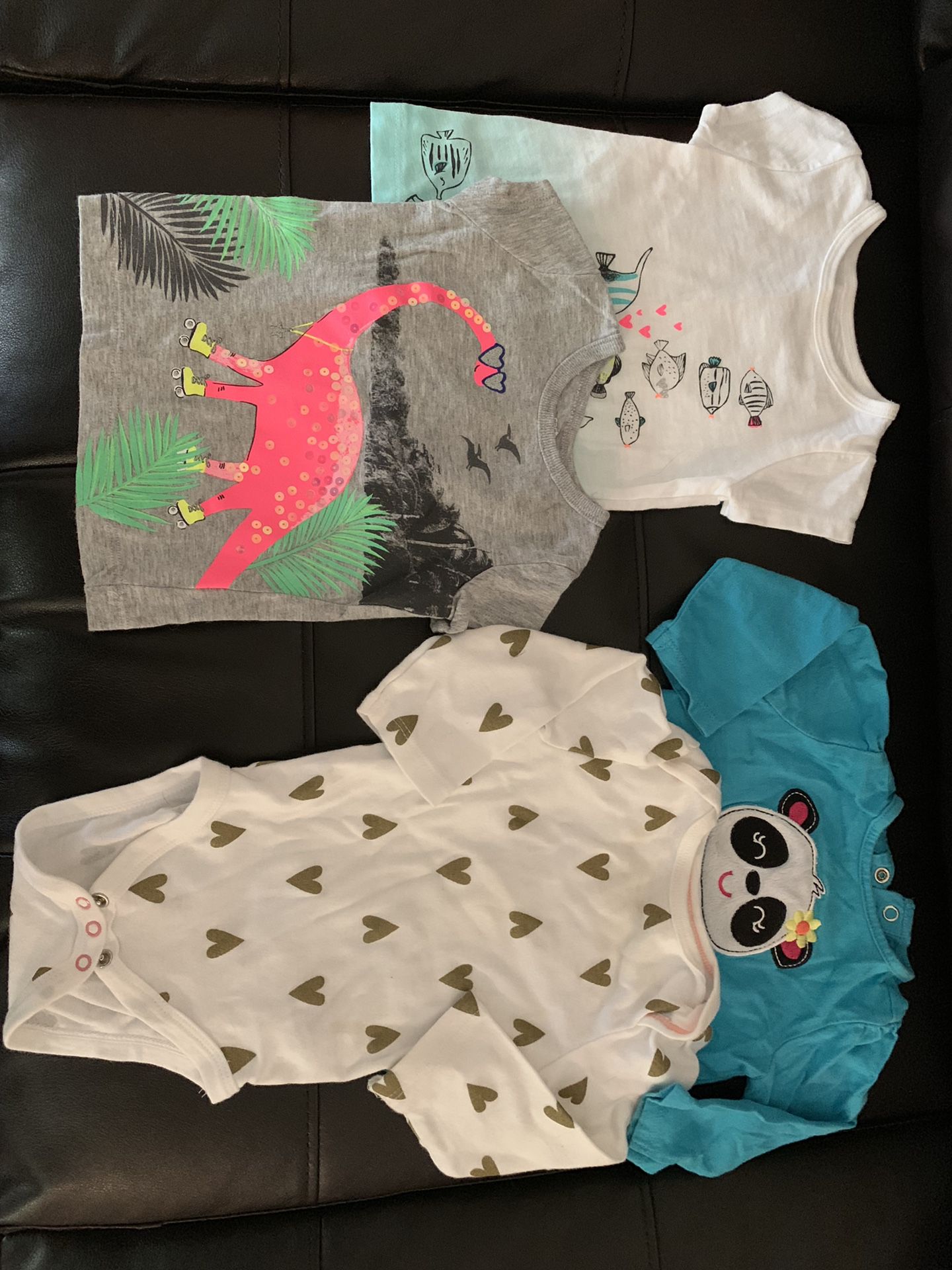 Baby girl clothes. Onesies, sleepers, dresses, and sweaters.