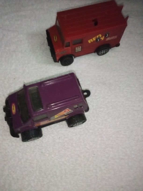 Purple Aero Van, And Red Delivery Box Truck 