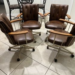 4 Rolling Chairs 