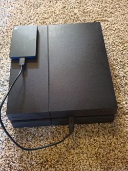 PLAYSTATION 4 WITH 2 GAMES 1 CONTROL