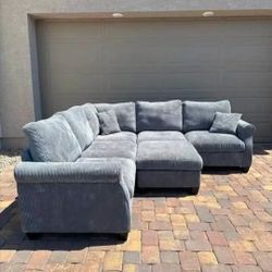 Quality sectional sofa with ottoman, lightly used and very clean