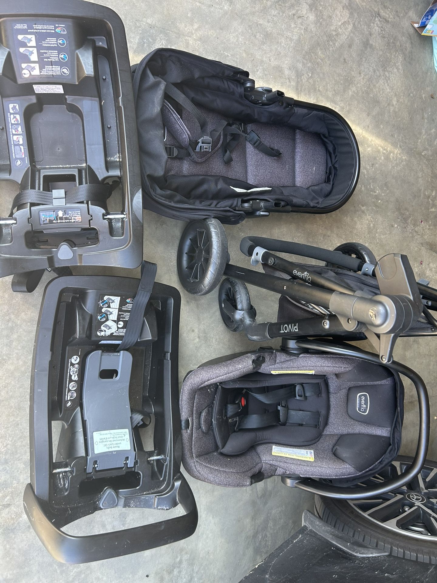 Car seat- Evenflo Travel System with 2 Unused Toddler Stroller Seat And 2 Gently Used Car Seat Base