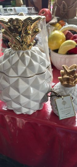 2 pineapples one cookie jar and fragrance the other one