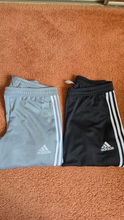 2 Adidas size medium n 2 jersey size L