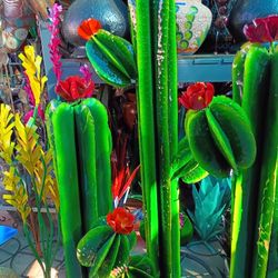 New Painted Metal 
Flowered Saguaro's 
3 Sizes 3 Prices 


