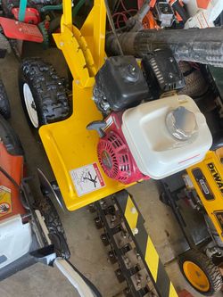 Ground hog trencher