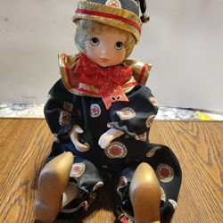 $5.00 Wind Up Musical Doll,,, Her Body Moves...
