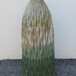 Beautiful contoured decrative Vase 17 in high 7 in round at base
