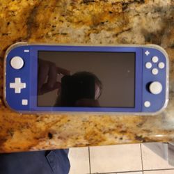 Nintendo Switch Lite W/games