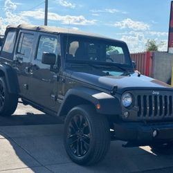 2017 Jeep Wrangler Unlimited Sport 4x4 Sport 4dr SUV Price $13,999 Mileage 91,