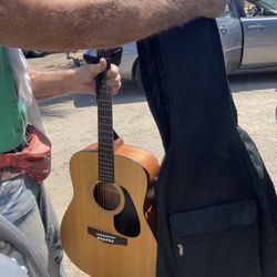 Yamaha acoustic guitar with case