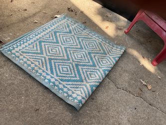 A small outsides rug (72” x36” wide) needs a little cleaning