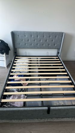 Bed frame with hydraulic under storage