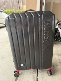 Hurley suitcase, checked bag