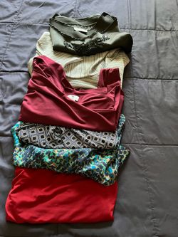 There is 6 tops therefore women’s the size is medium and large all for $60 total